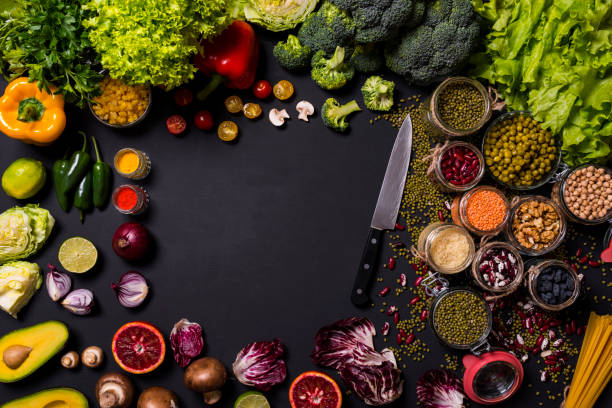 istock Various fruits and vegetables on black background. Copy Space. 1139064096