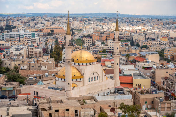21/22/2019 Madaba, Jordan, view of the central and largest mosque with high minarets in the ancient city of the middle east.
selective focus 21/22/2019 Madaba, Jordan, view of the central and largest mosque with high minarets in the ancient city of the middle east.
selective focus jordan middle east photos stock pictures, royalty-free photos & images