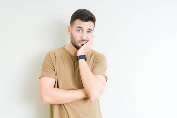 istock Young handsome man over isolated background thinking looking tired and bored with depression problems with crossed arms. 1139065290