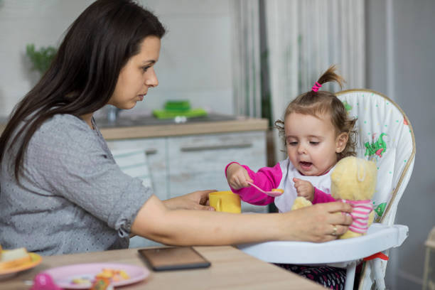 istock Breakfast with baby daughter 1139065326