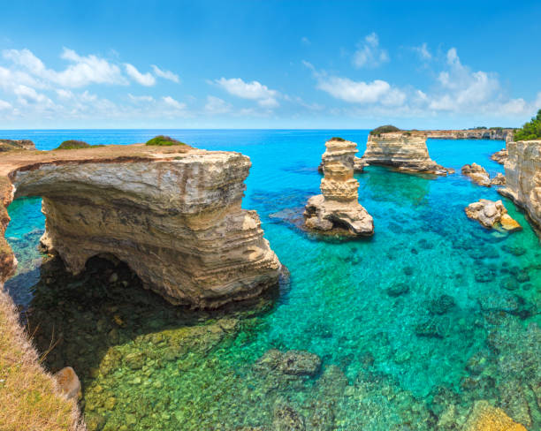 istock Faraglioni at Torre Sant Andrea, Italy 1139067171