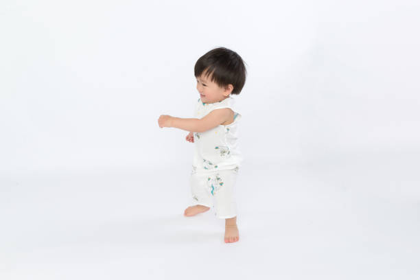 istock The toddler wore a robe with a white background 1139069506