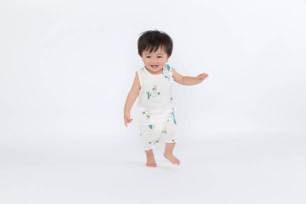 istock The toddler wore a robe with a white background 1139069511