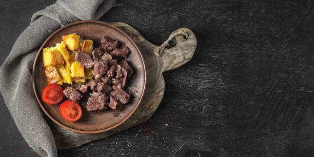 istock Baked beef with croutons, cherry tomatoes 1139076659