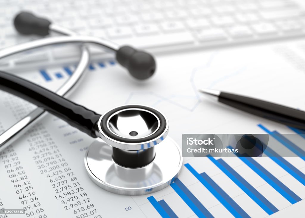 Stethoscope with financial statement Healthcare And Medicine Stock Photo