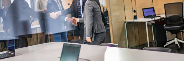 istock Business people shaking hand in the office 1139078937