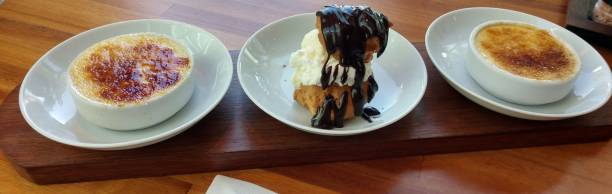 istock Close-up of creme brulee and profiteroles 1139078946