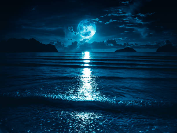 super moon. colorful sky with bright full moon over seascape. - kd imagens e fotografias de stock