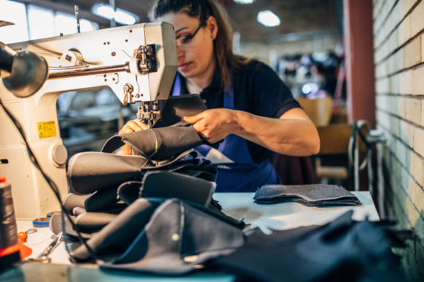istock Woman sewing shoes 1139082626