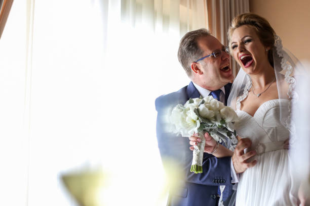 istock Happy bridal couple embracing 1139085238