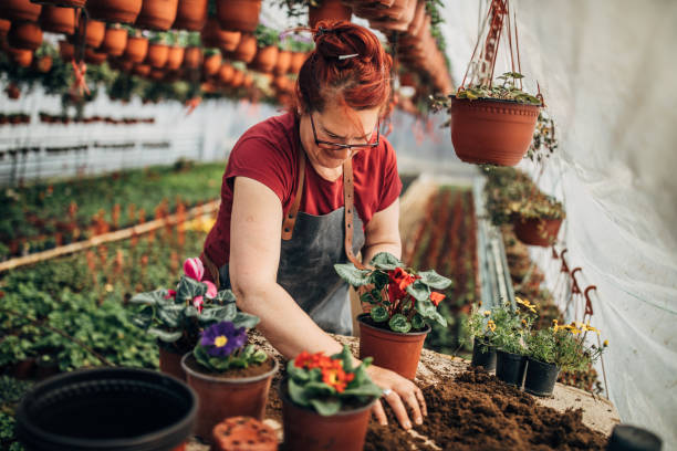 Woman nursing flowers