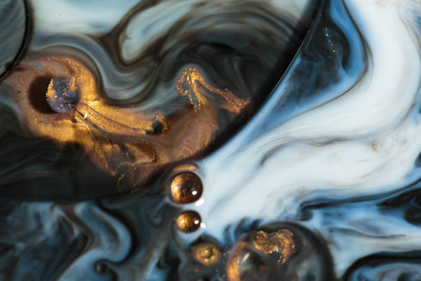 Marble abstract acrylic background. Blue marbling artwork texture. Agate ripple pattern. Gold powder.