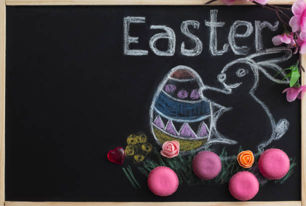 istock congratulations on Easter on the children's Board with macaroons, with a copy of space 1139089949