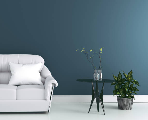 istock Living room interior with fabric sofa and plants on empty white wall background. 3d rendering 1139090046