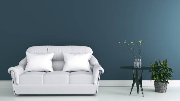 istock Living room interior with fabric sofa and plants on empty white wall background. 3d rendering 1139090085