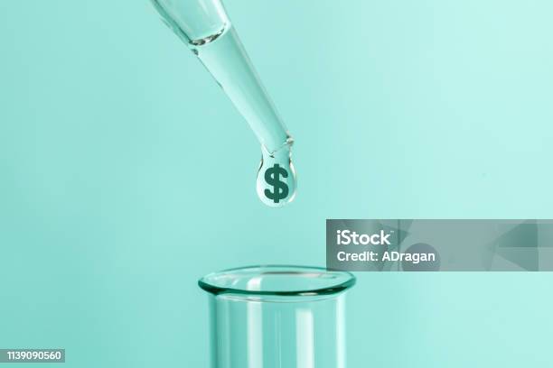 Expensive Laboratory Tests And Analyzes From Pipette Drops Feces With Symbol Of Money Dollars Into Test Tube Stock Photo - Download Image Now