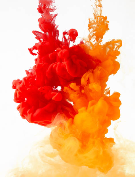 istock Colored ink in water creating abstract shape, isolated on white background 1139092394