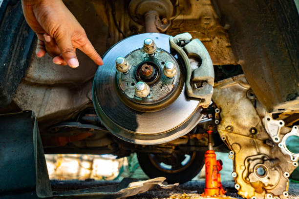 istock Take off car wheel in car service automobile 1139094189