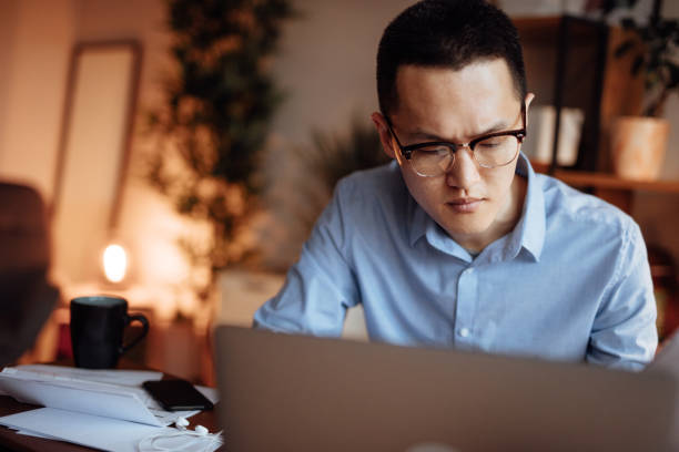 istock Man calculating his financial bills 1139096573