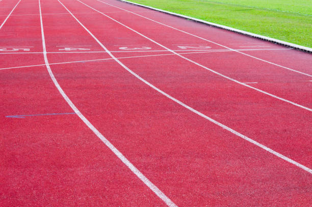 istock Running track and green grass 1139099919