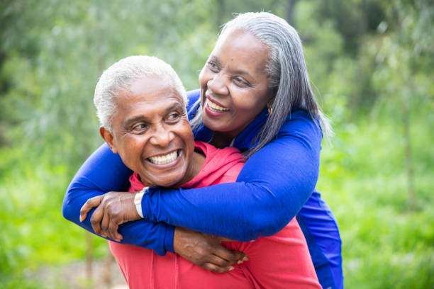 istock Senior Black Couple Piggyback in the Forest 1139101109