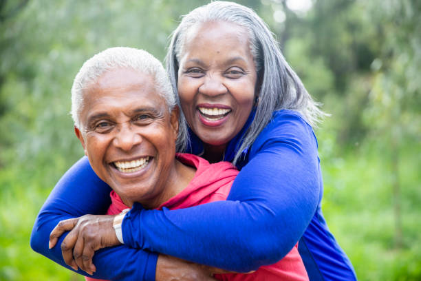 istock Senior Black Couple Piggyback in the Forest 1139101164