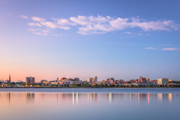 Portland, Maine, USA downtown skyline from Back Cove Portland, Maine, USA downtown skyline from Back Cove at dawn. maine landscape new england sunset stock pictures, royalty-free photos & images