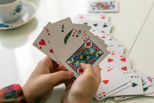 istock Woman with Playing Cards 1139102954