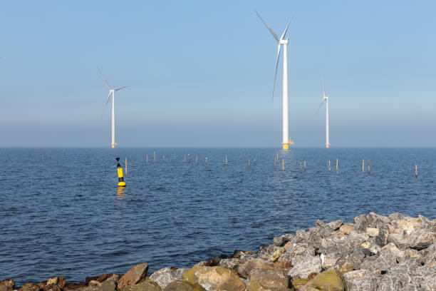 istock Offshore wind turbines near Dutch coast with buoy 1139104862