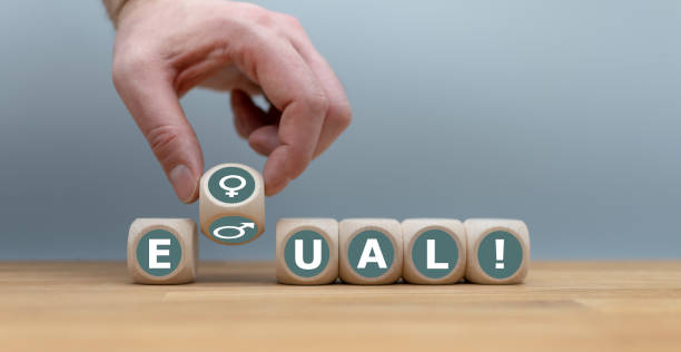 istock Symbol for gender equality. Dice form the word 
