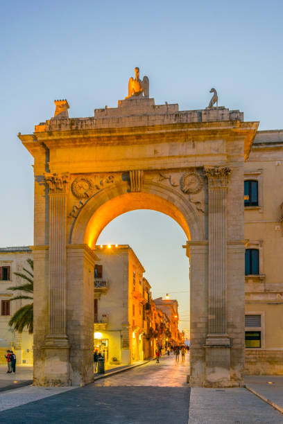 Sunset view of the Porta Reale o Ferdinandea in Noto, Sicily, Italy Sunset view of the Porta Reale o Ferdinandea in Noto, Sicily, Italy noto sicily stock pictures, royalty-free photos & images
