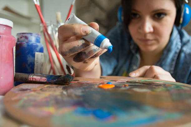 istock Woman with acrylic paint 1139107291