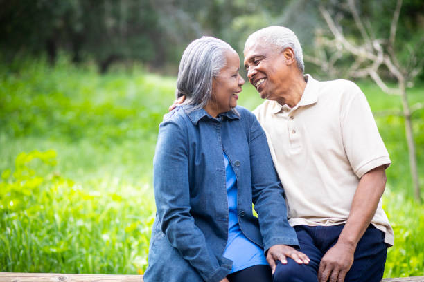 istock Black Senior Couple Sharing Tender Moment in Nature 1139107323