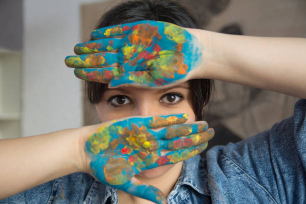 istock Artist with hands full of color 1139107708