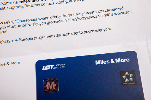 Zgierz, Poland - March 28, 2019:  A sales letter with a new Miles & More Classic card from LOT Polish Airlines, which cooperates with Star Alliance. With the Miles & Mores card, you can collect points and exchange for prizes or airline tickets.