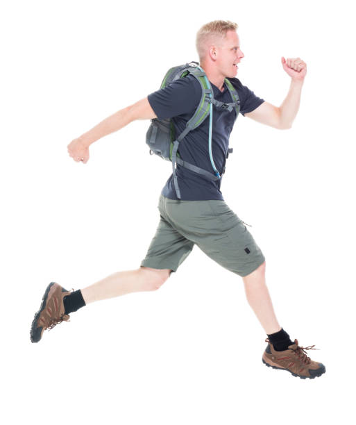 istock Attractive young male hiker running and jumping 1139109122