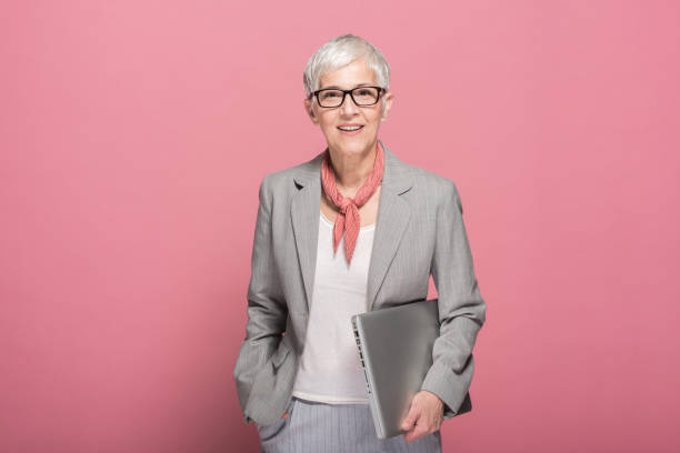 Woman holding laptop