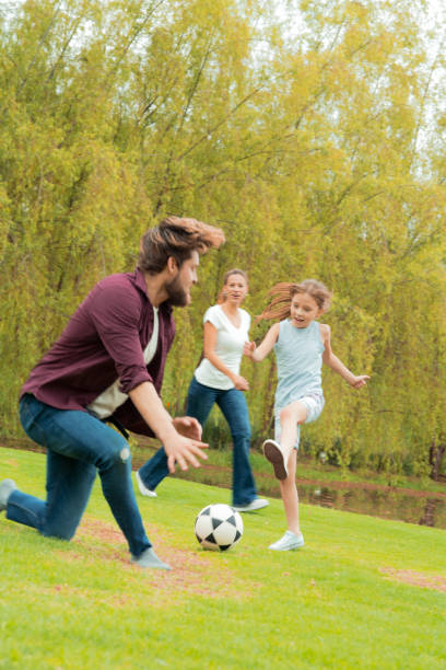 istock family playing soccer 1139111945
