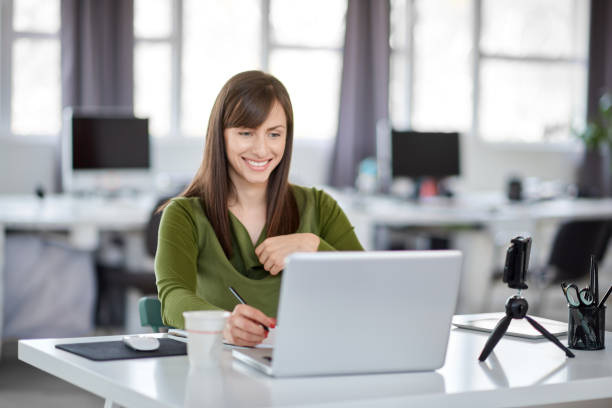 istock Woman using laptop in office. 1139113968