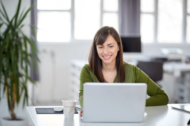 istock Woman using laptop in office. 1139113982