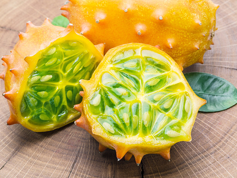 Kiwano fruits on the wooden table.