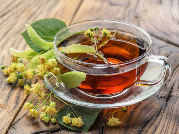 istock Cup of linden tea and lime flowers. 1139116178
