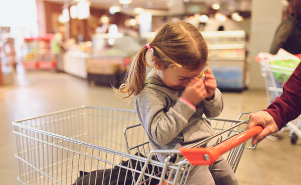 istock Child Having Arguement With parent in store 1139121577