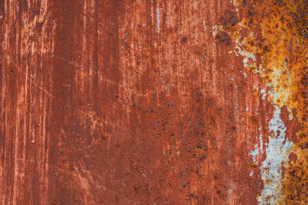 istock Macro texture of peeled paint on rusty iron closeup. 1139122586