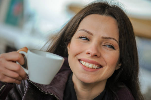 istock Beautiful woman drinking a coffee 1139126817