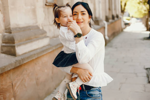istock Mother with daughter in a city 1139126826