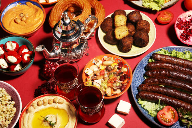 istock Middle eastern or arabic dishes and assorted meze, concrete rustic background. Falafel. Turkish Dessert Baklava with pistachio. Halal food. Lebanese cuisine 1139128675