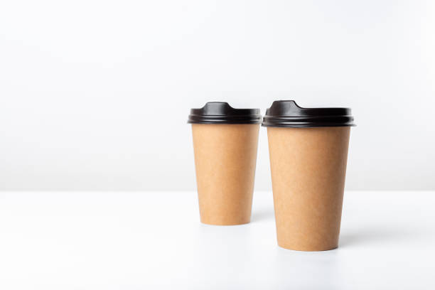 Two craft coffee cups isolated on white background.