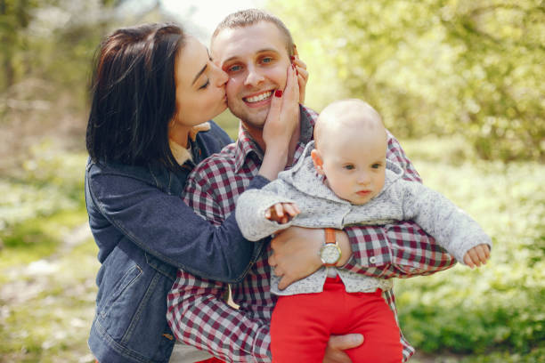 istock Family in a spring park 1139130364