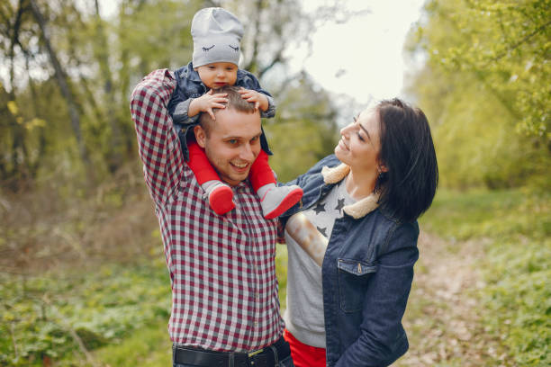 istock Family in a spring park 1139131355